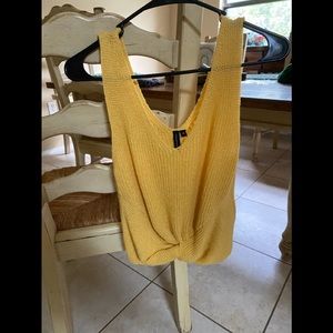 Yellow tank with twist